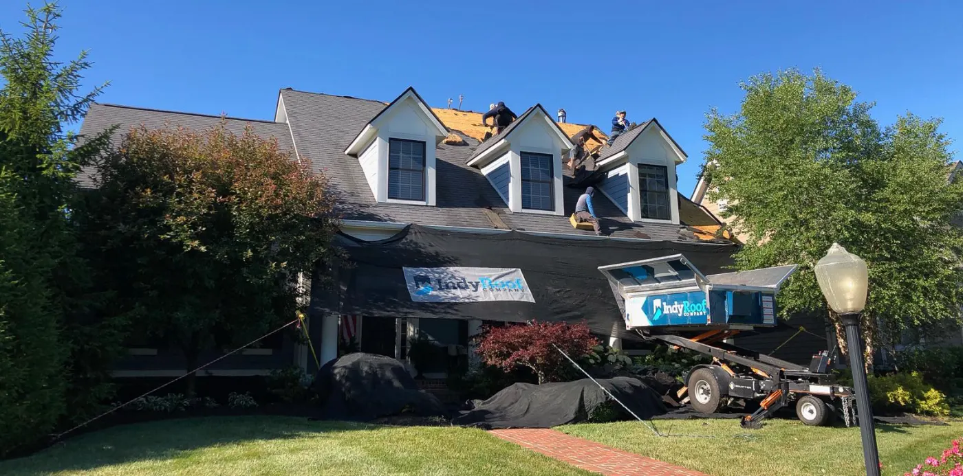 Tarping and dry-in on a Springmill Ponds commercial roof